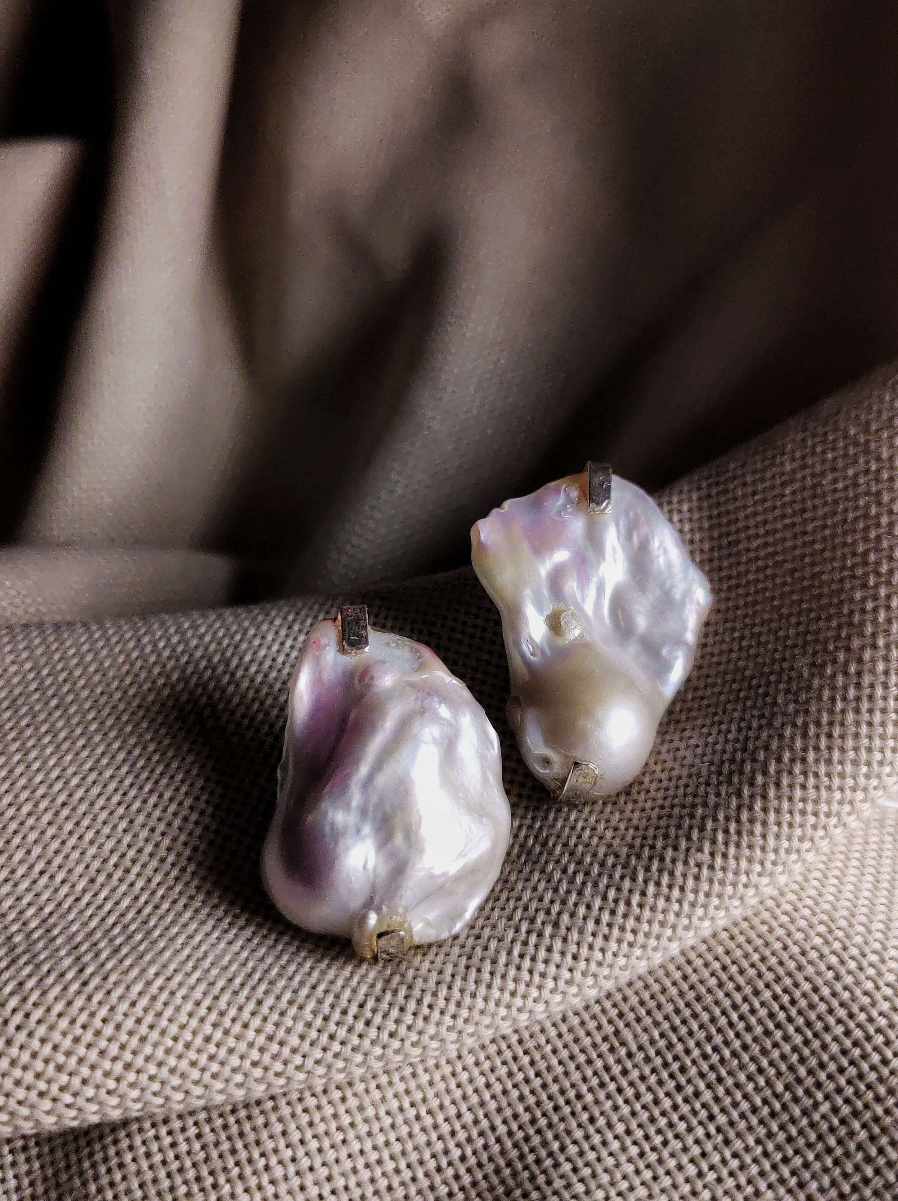 Veronica: A handcrafted Earrings featuring nan and hues of nan.