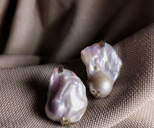 Veronica: A handcrafted Earrings featuring nan and hues of nan.