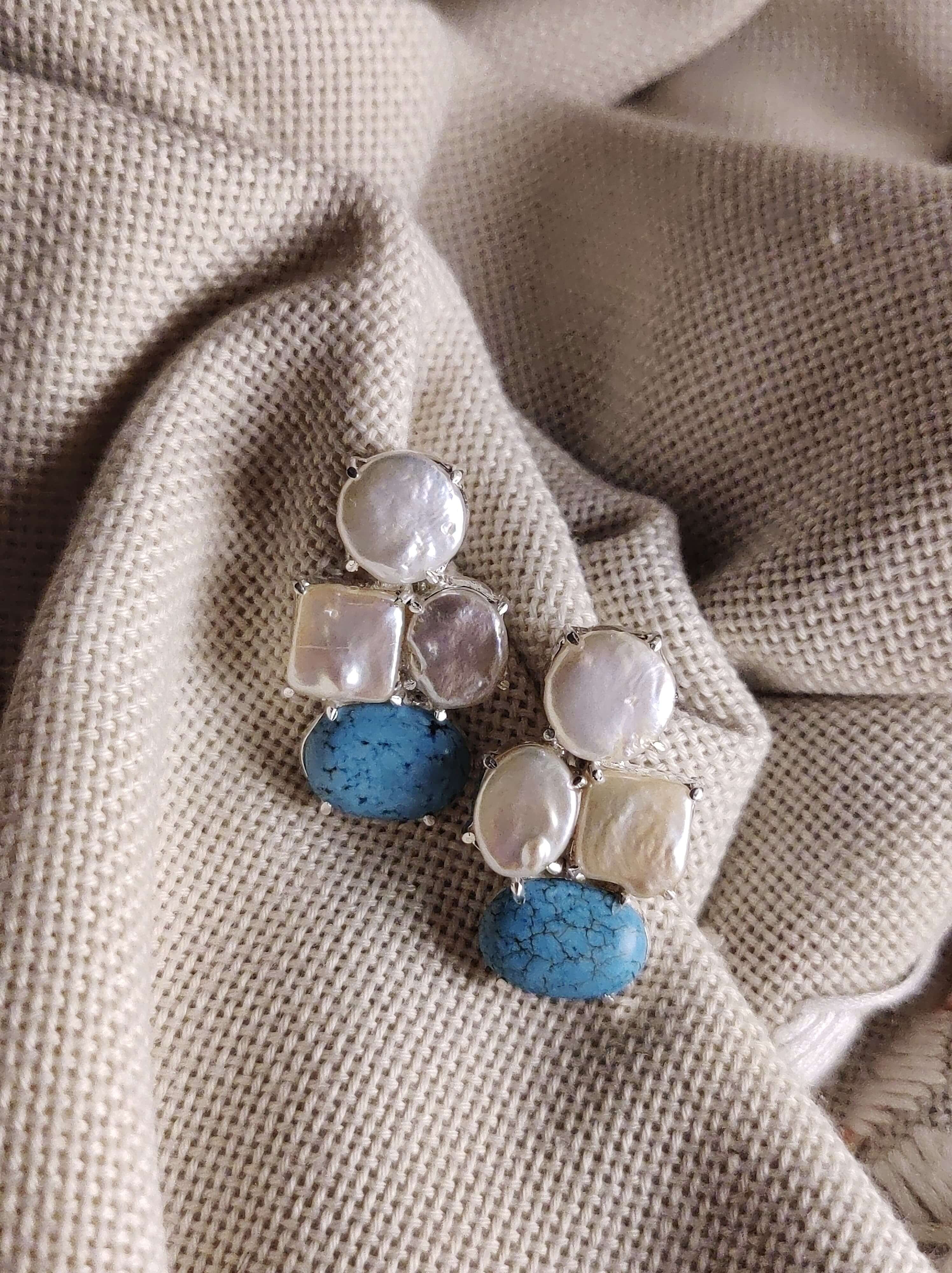 Hana: A handcrafted Earrings featuring nan and hues of nan.