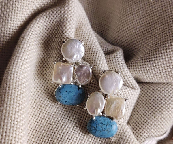 Hana: A handcrafted Earrings featuring nan and hues of nan.