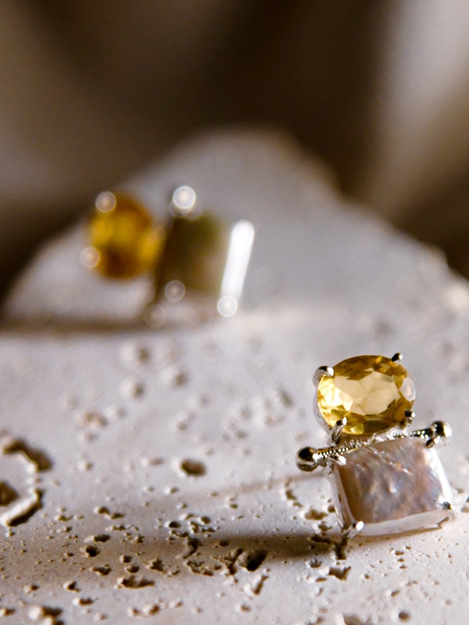Kirin: A handcrafted Earrings featuring Pearl Citrine and hues of Yellow White.