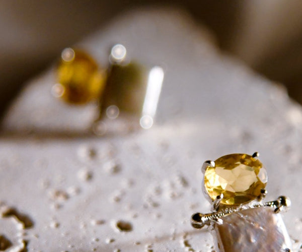 Kirin: A handcrafted Earrings featuring Pearl Citrine and hues of Yellow White.