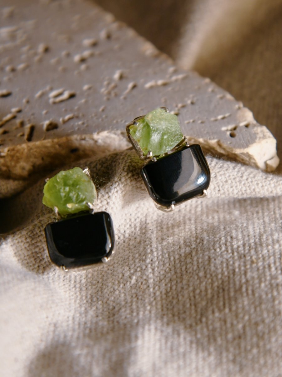 Beas: A handcrafted Earrings featuring Onyx Peridot and hues of Green Black.