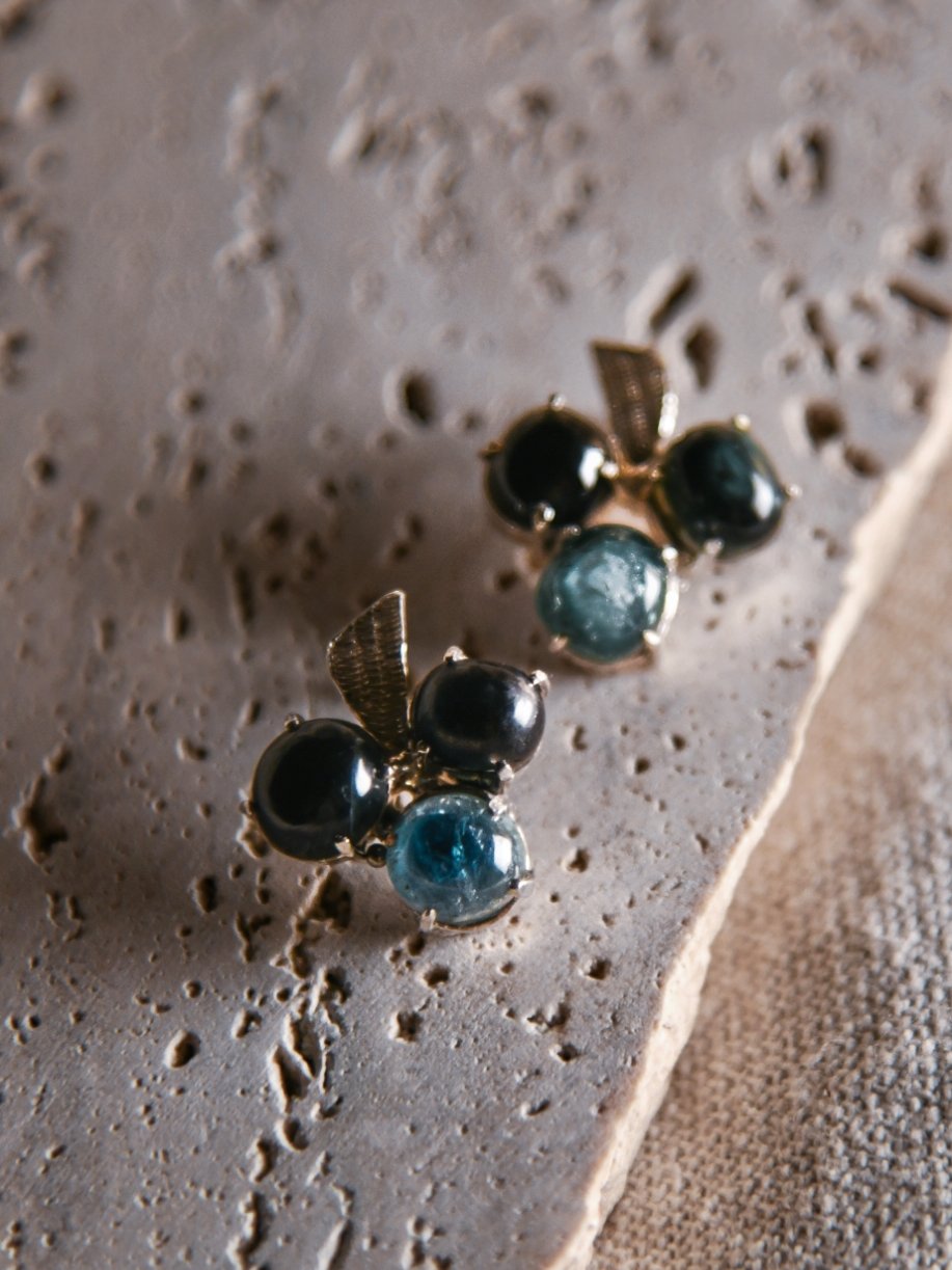 Momiji: A handcrafted Earrings featuring Sapphire and hues of Blue.