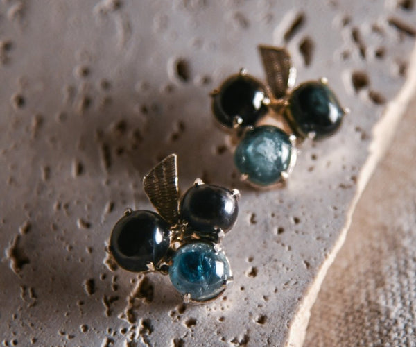 Momiji: A handcrafted Earrings featuring Sapphire and hues of Blue.