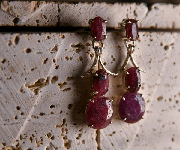 Anuli: A handcrafted Earrings featuring Ruby and hues of Red.