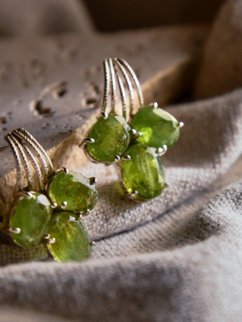 Asha: A handcrafted Earrings featuring Peridot and hues of Green.