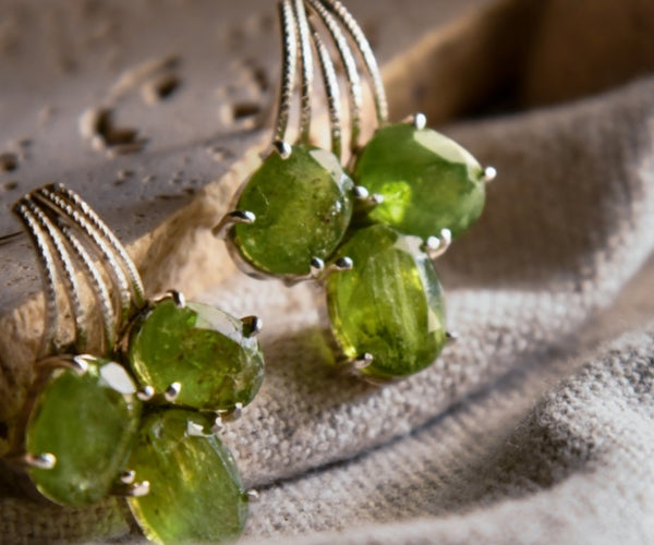 Asha: A handcrafted Earrings featuring Peridot and hues of Green.