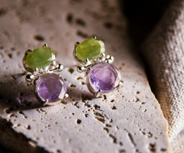 Imani: A handcrafted Earrings featuring Amethyst Peridot and hues of Green Purple.