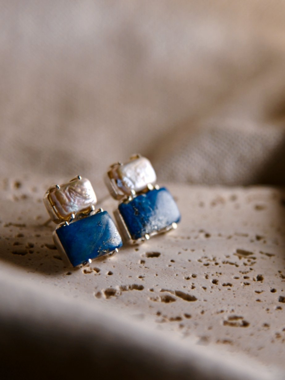Koga: A handcrafted Earrings featuring Lapis Lazuli Pearl and hues of Blue White.