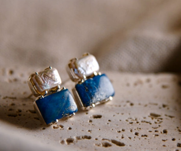 Koga: A handcrafted Earrings featuring Lapis Lazuli Pearl and hues of Blue White.