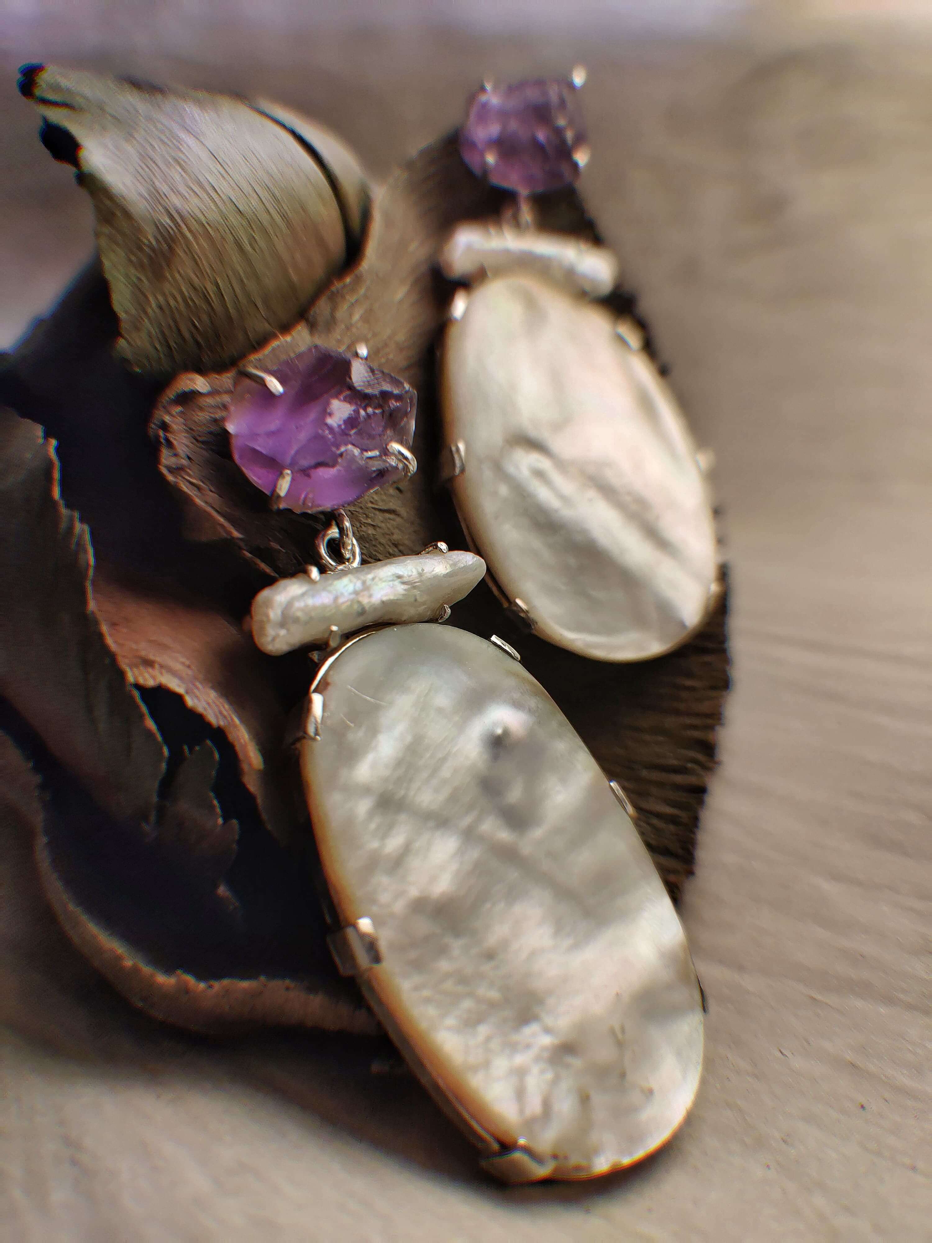 Mother: A handcrafted Earrings featuring  Mother Pearl Amethyst and hues of White Purple.
