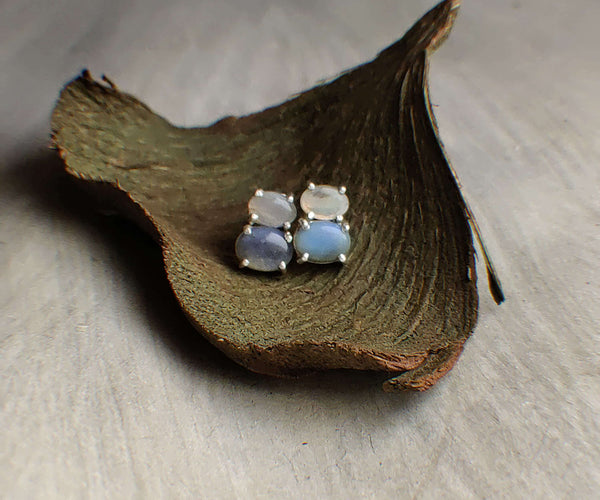 James & Lily: A handcrafted Earrings featuring Opal and hues of White.