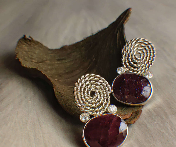 Victoria: A handcrafted Earrings featuring Ruby  Zirconia and hues of White Red.