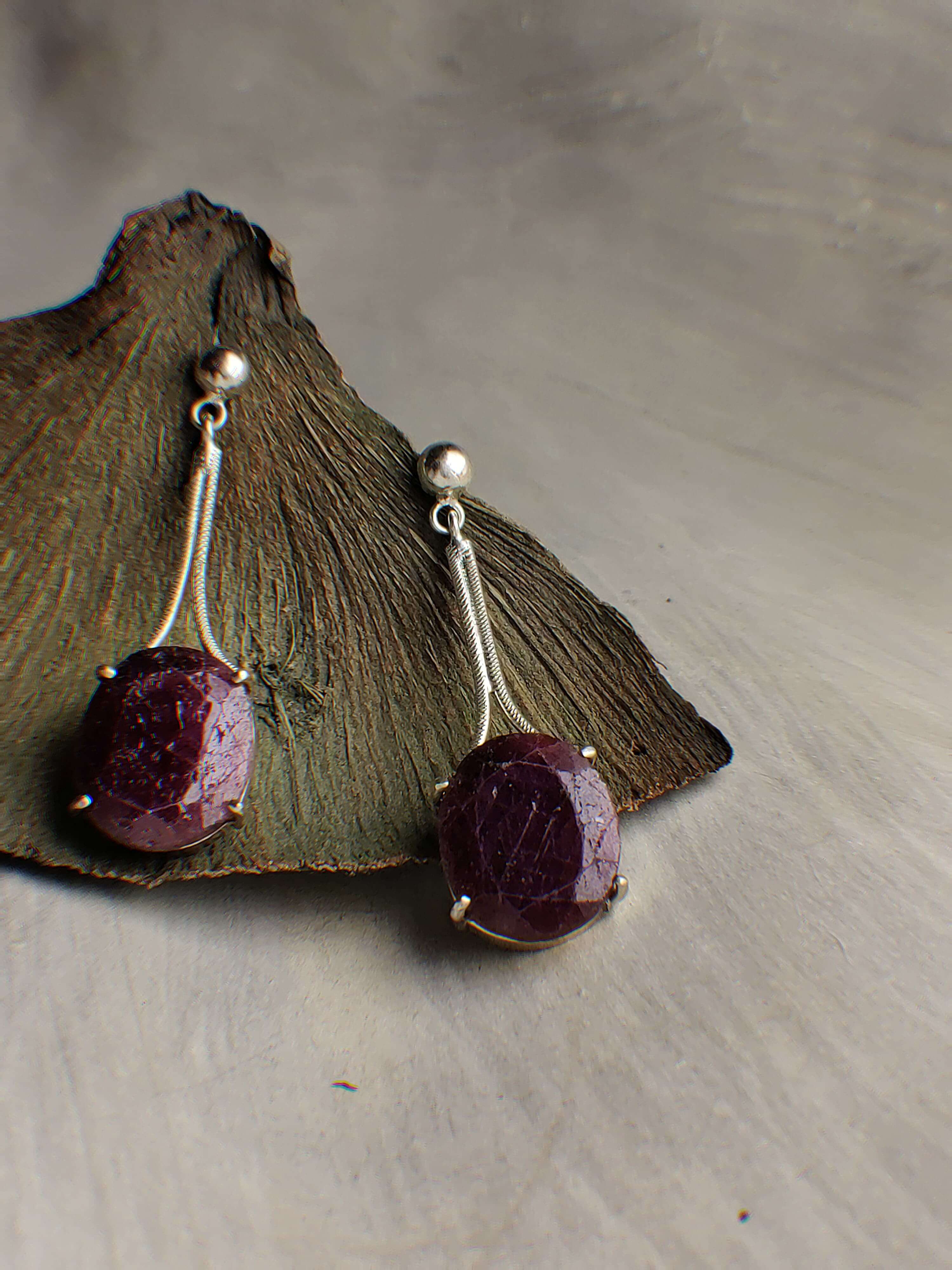 Birds: A handcrafted Earrings featuring Ruby and hues of Red.