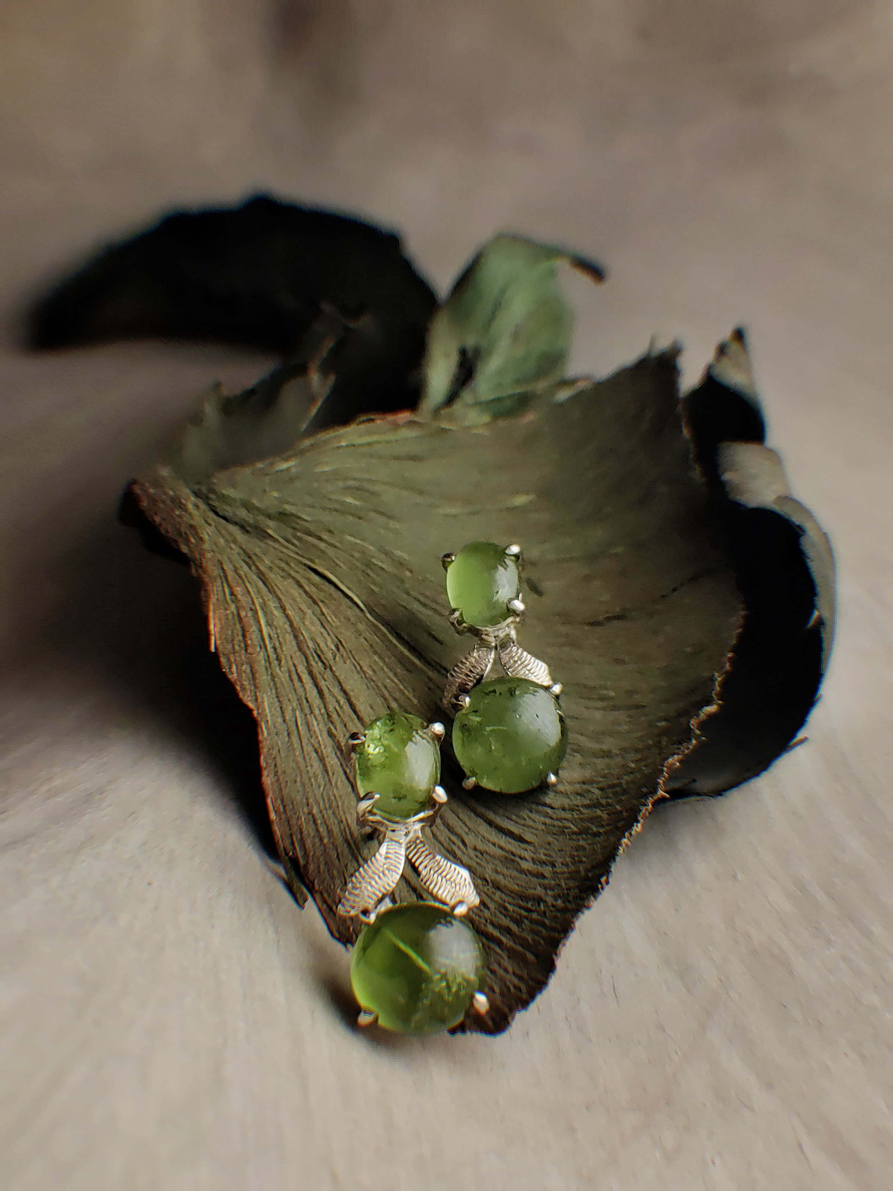 Chardonnay: A handcrafted Earrings featuring Peridot and hues of Green.