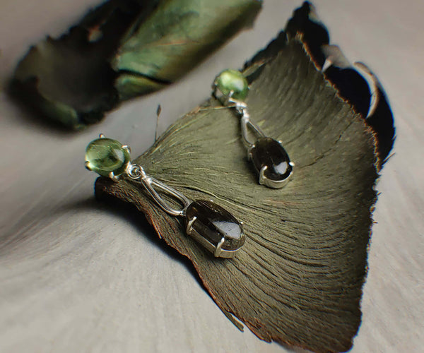 Leaf: A handcrafted Earrings featuring Peridot Tourmaline and hues of Green.