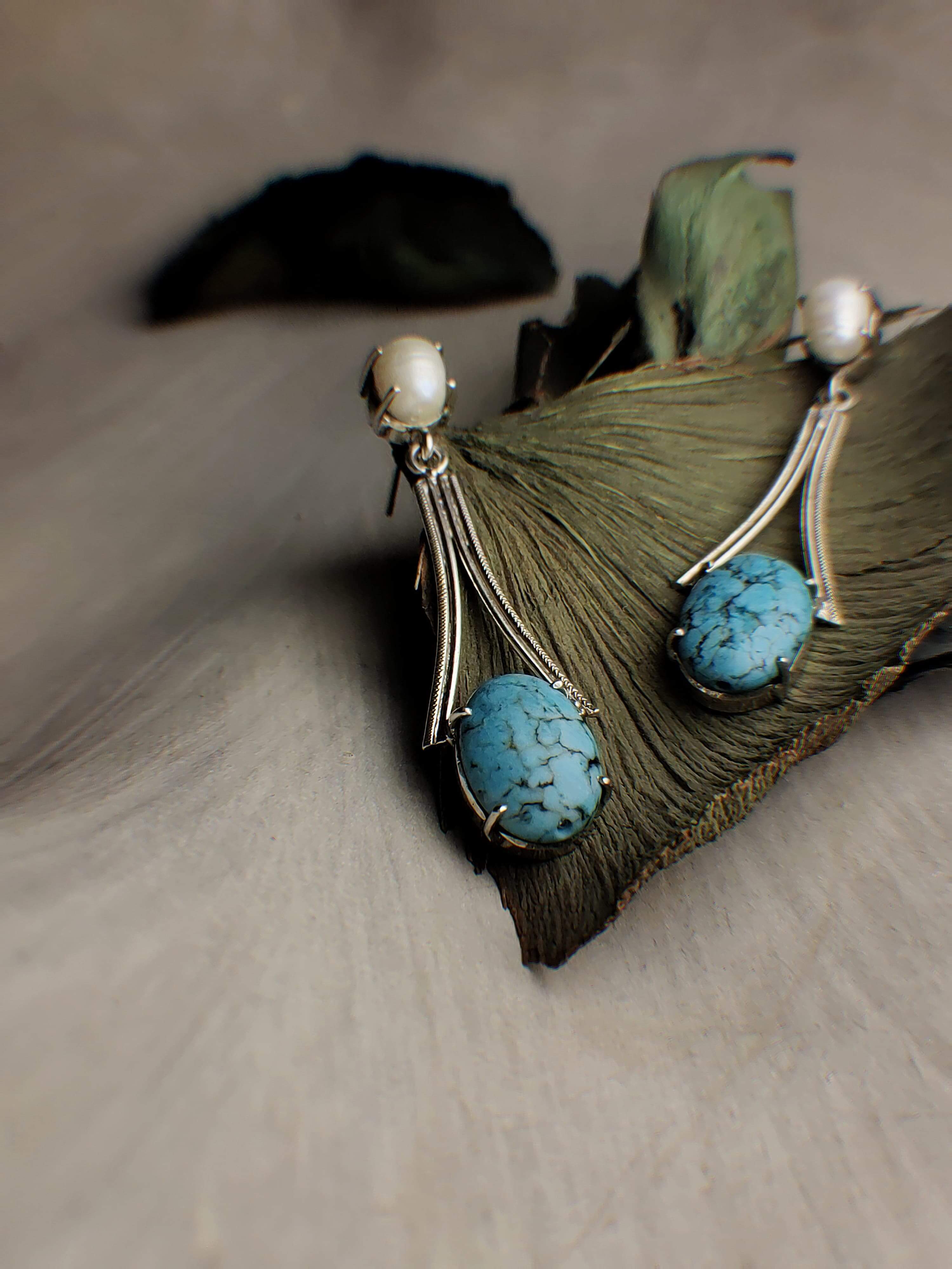 Summer sky: A handcrafted Earrings featuring nan and hues of White Blue.