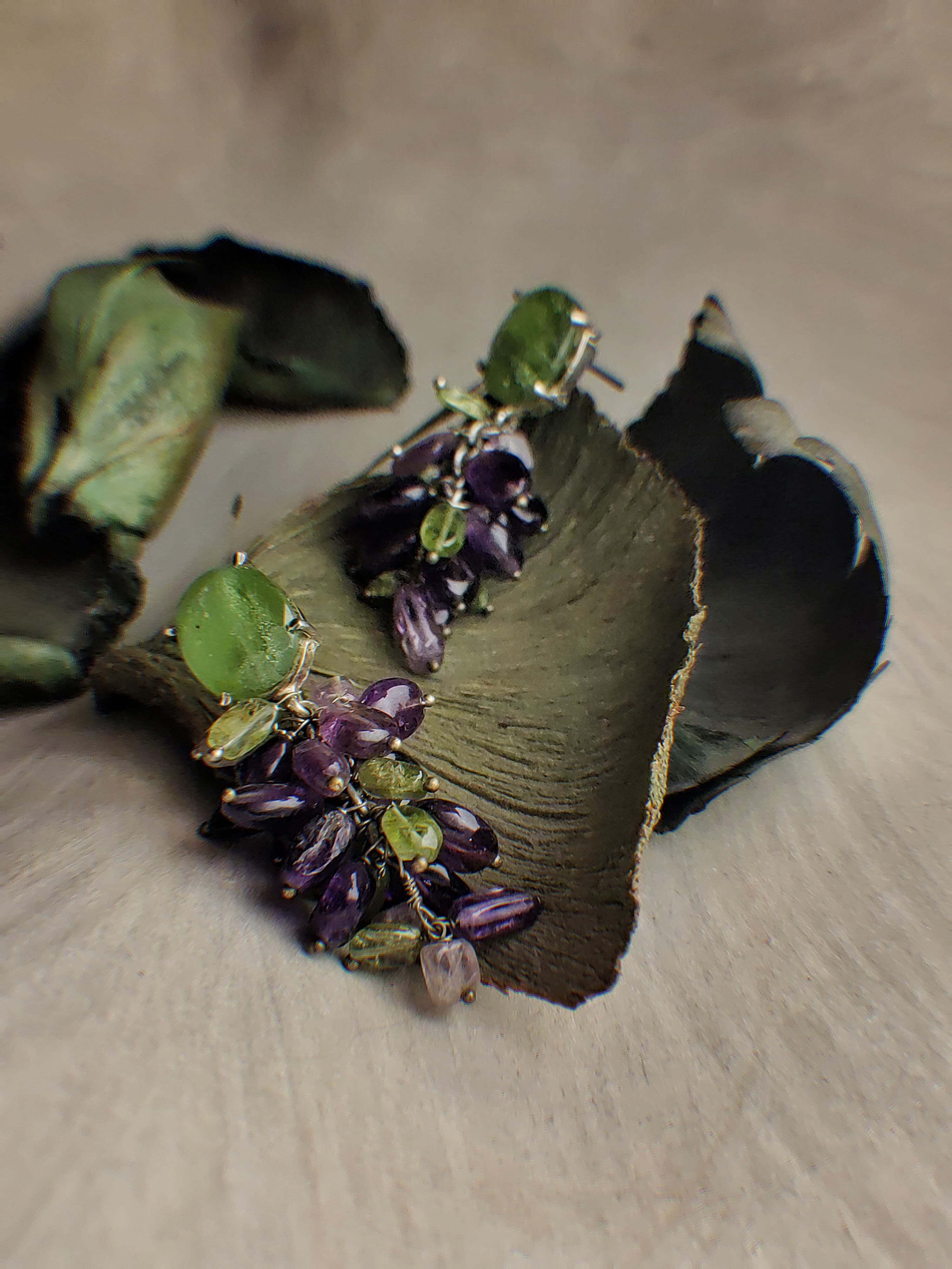 Vines: A handcrafted Earrings featuring Amethyst Peridot and hues of Purple Green.