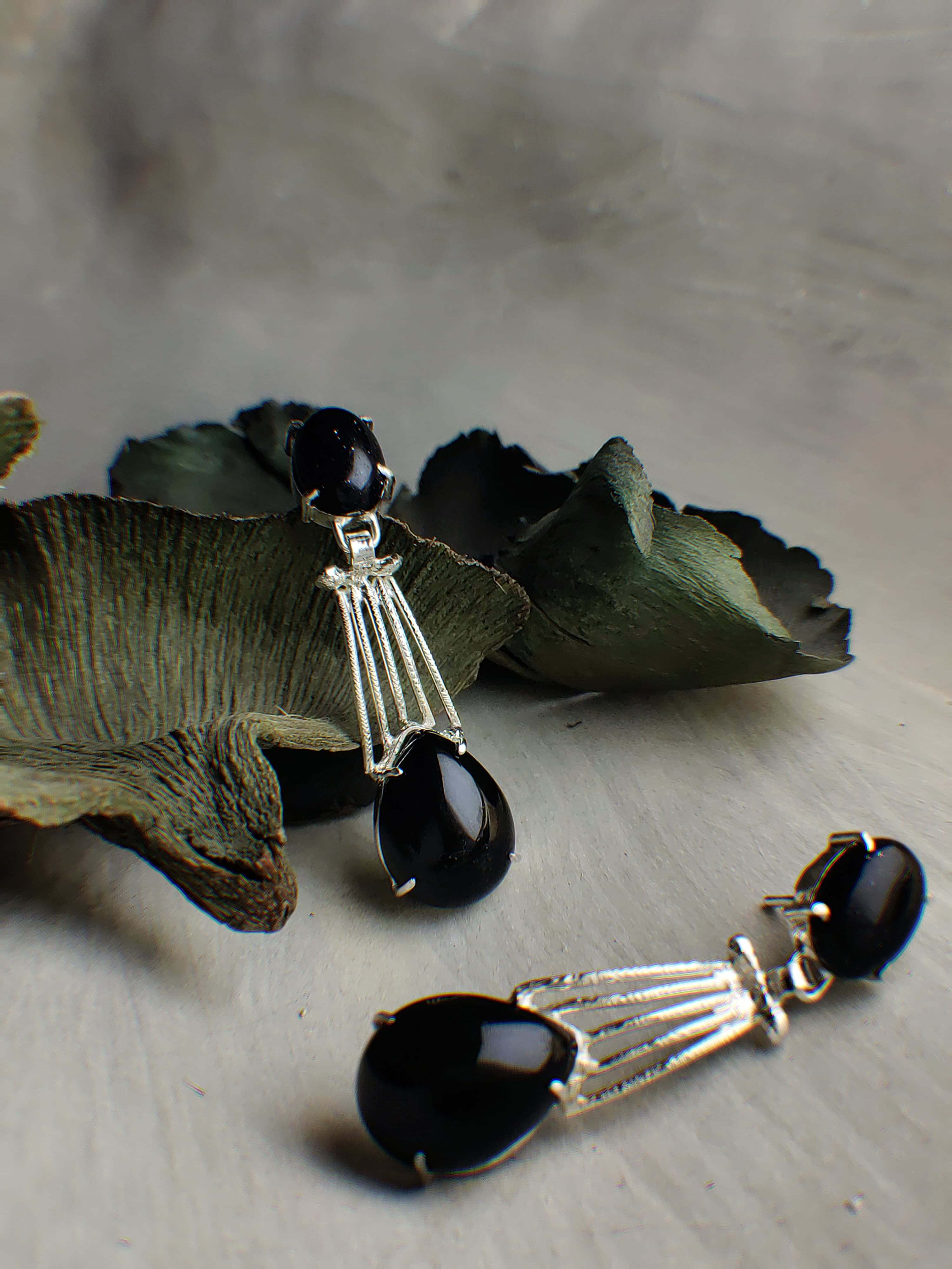 Shay: A handcrafted Earrings featuring Onyx and hues of Black.