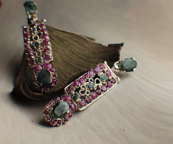 Infinity: A handcrafted Earrings featuring Ruby Emerald and hues of Green Red.