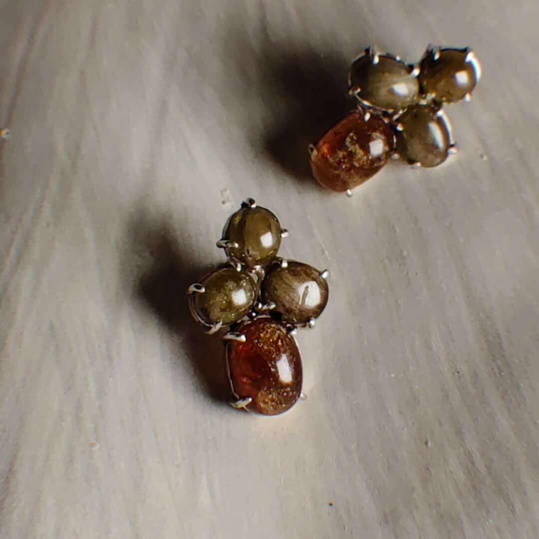 Ember: A handcrafted Earrings featuring nan and hues of Brown Yellow.