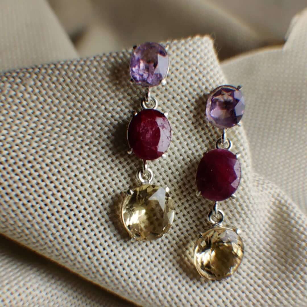 Mama's love: A handcrafted Earrings featuring Amethyst Ruby Topaz and hues of Yellow Purple Red.