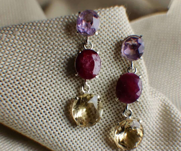 Mama's love: A handcrafted Earrings featuring Amethyst Ruby Topaz and hues of Yellow Purple Red.