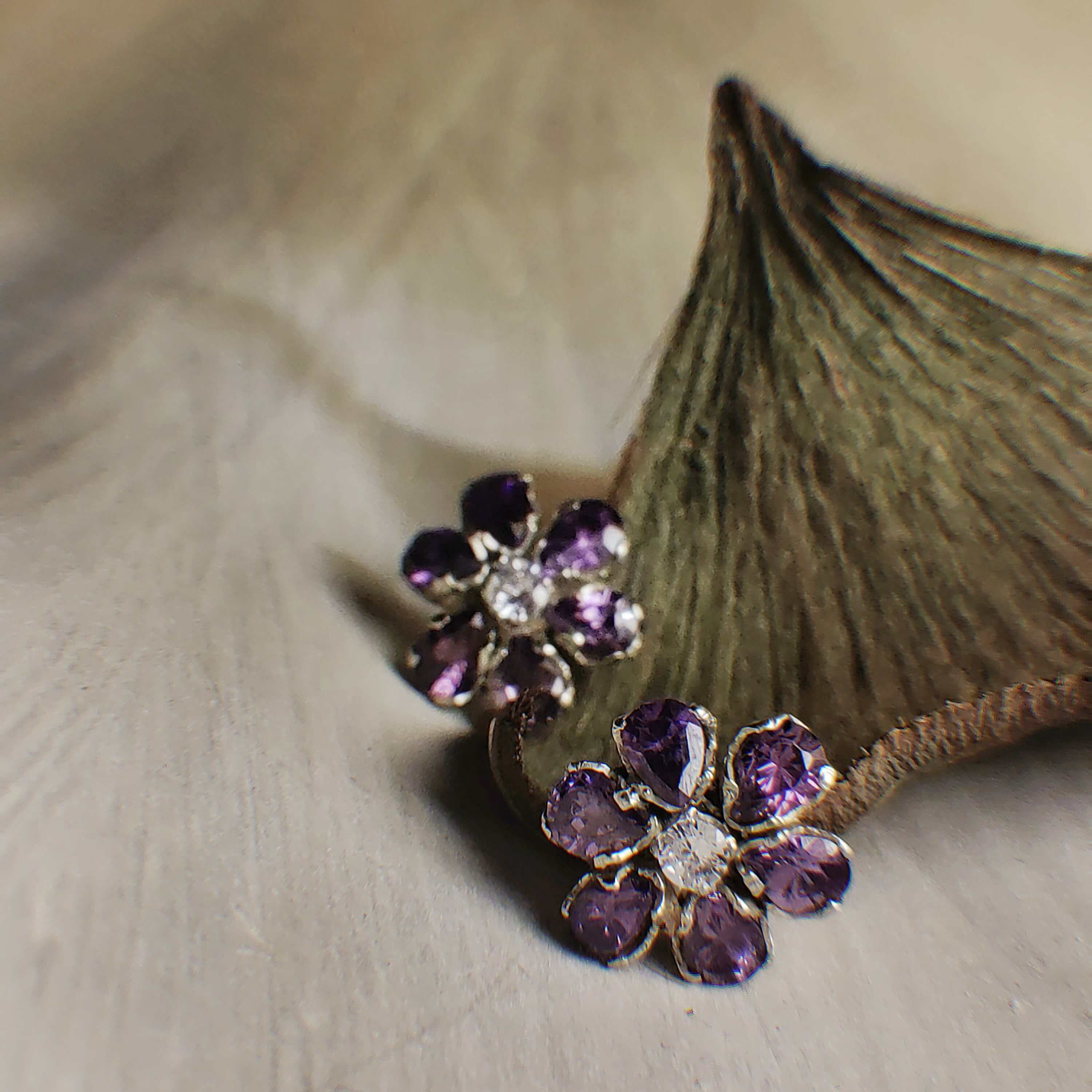 Rose: A handcrafted Earrings featuring Amethyst  Zirconia and hues of Purple White.