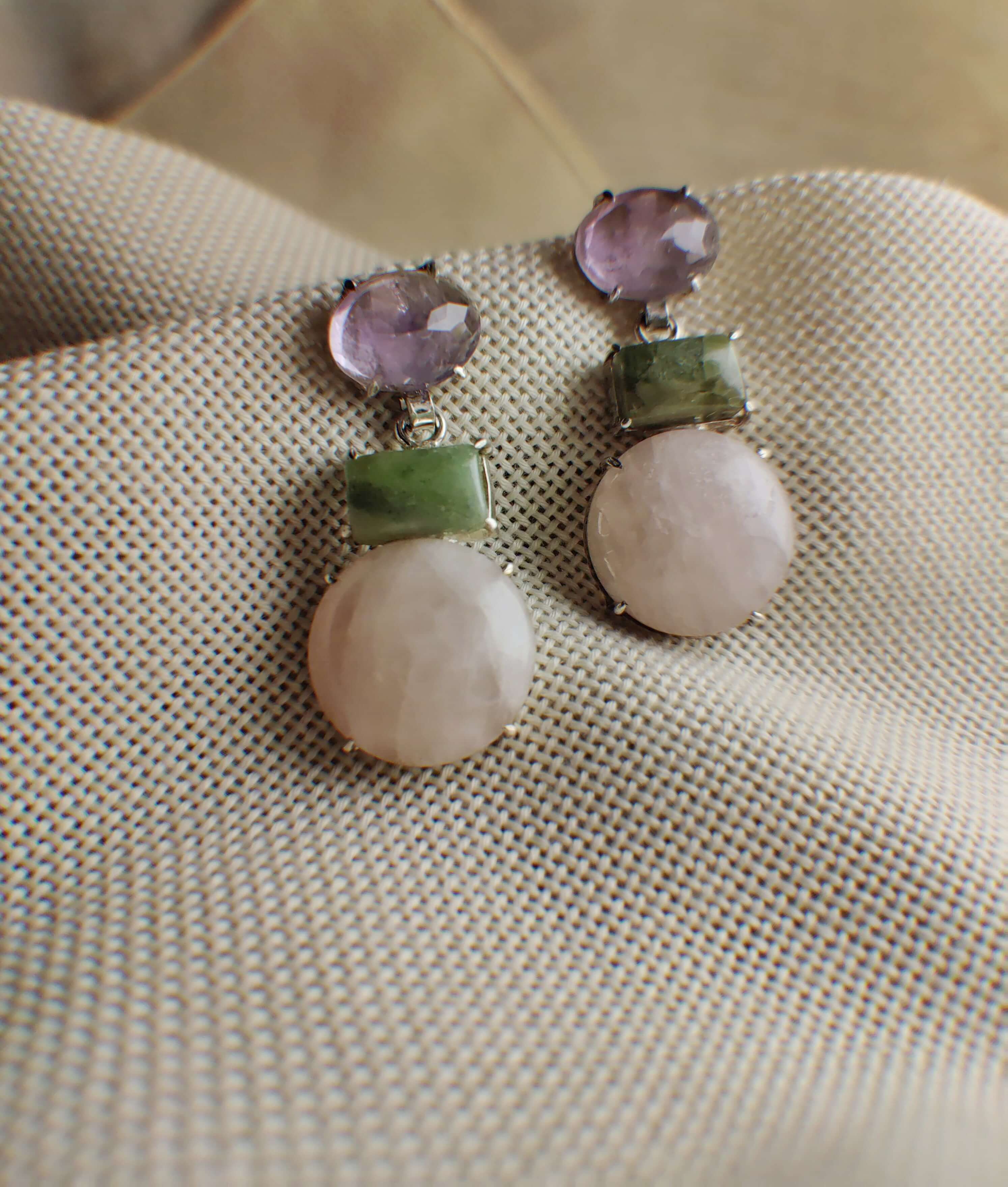 Heather: A handcrafted Earrings featuring Amethyst Quartz Peridot and hues of Purple Green Pink.