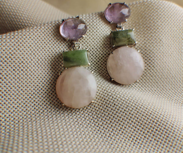 Heather: A handcrafted Earrings featuring Amethyst Quartz Peridot and hues of Purple Green Pink.
