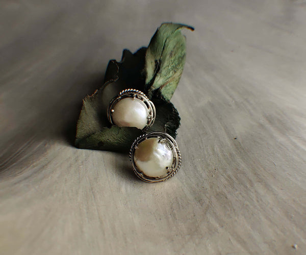 Blushing pearls: A handcrafted Earrings featuring Pearl and hues of White.