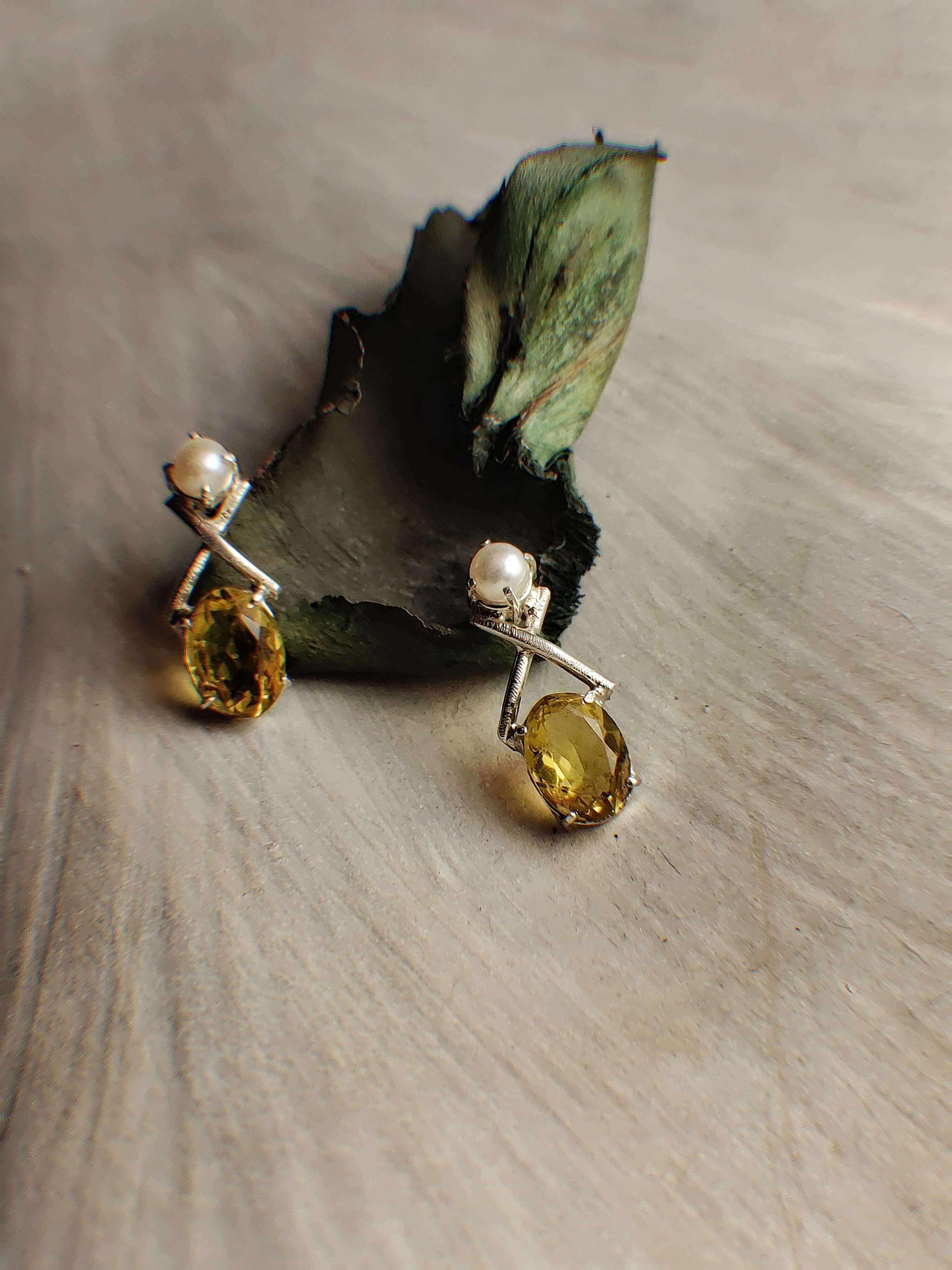 Yellow Moon: A handcrafted Earrings featuring Pearl Topaz and hues of White Yellow.