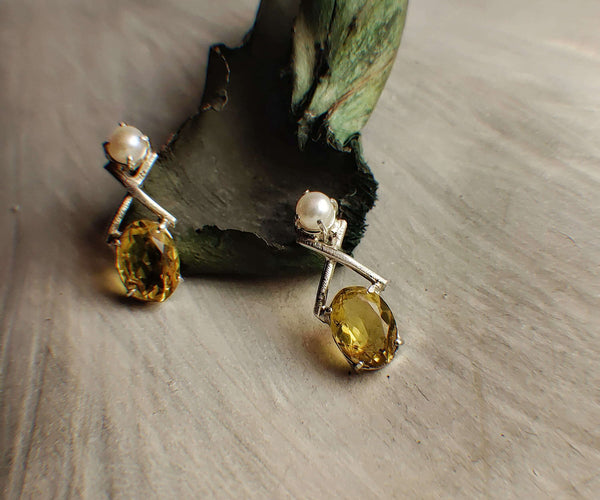 Yellow Moon: A handcrafted Earrings featuring Pearl Topaz and hues of White Yellow.