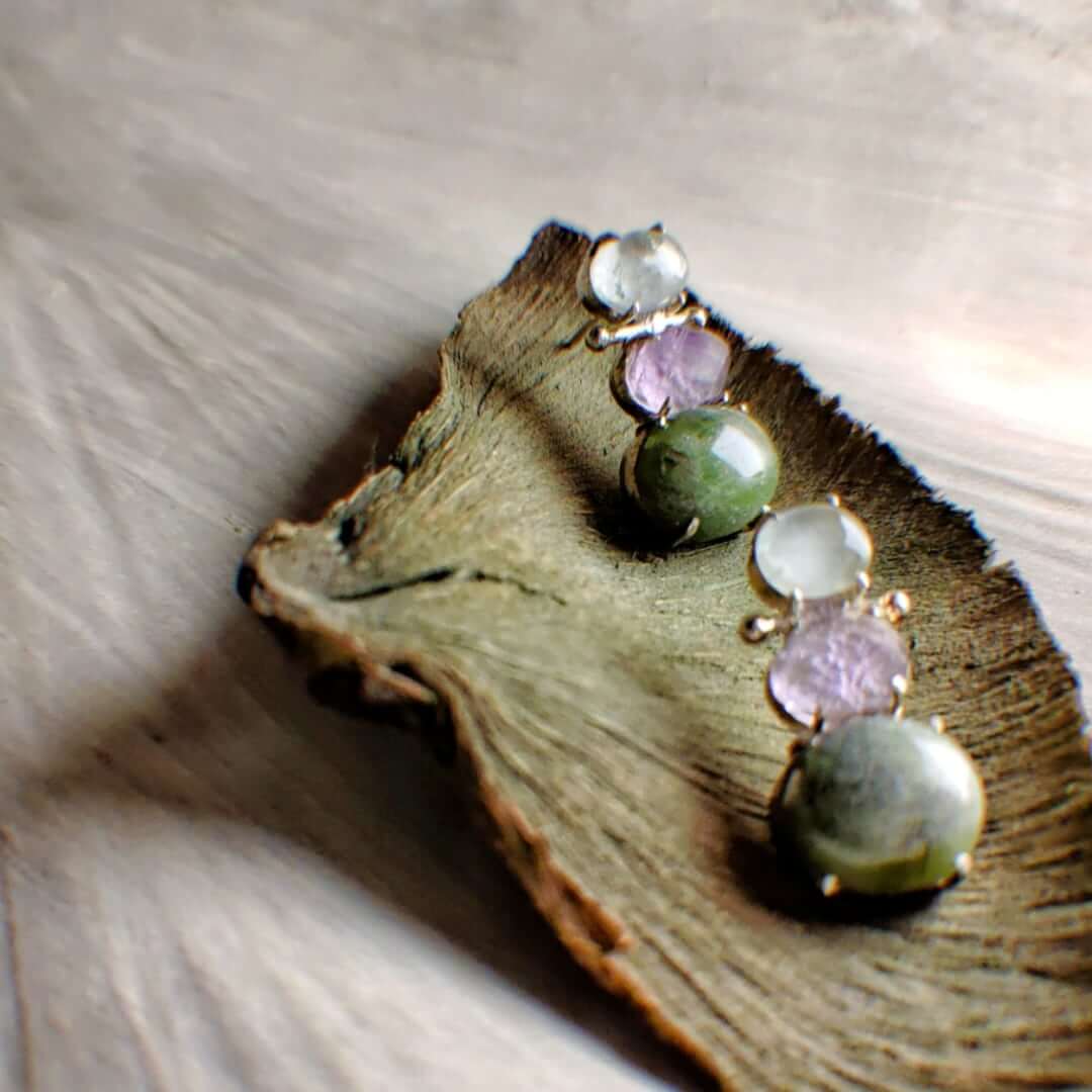 Little mermaid: A handcrafted Earrings featuring Aquamarine Peridot Amethyst and hues of Blue Purple Green.