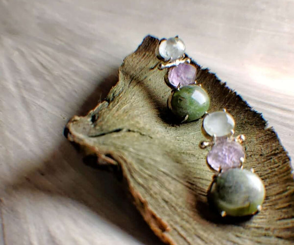 Little mermaid: A handcrafted Earrings featuring Aquamarine Peridot Amethyst and hues of Blue Purple Green.