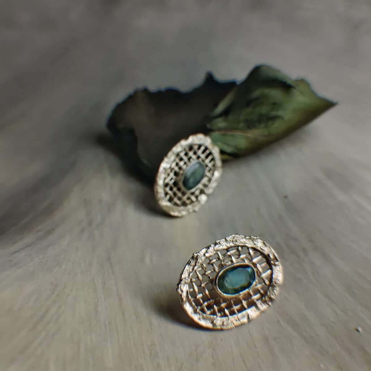 Bee orchid: A handcrafted Earrings featuring Emerald and hues of Green.