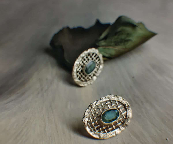Bee orchid: A handcrafted Earrings featuring Emerald and hues of Green.