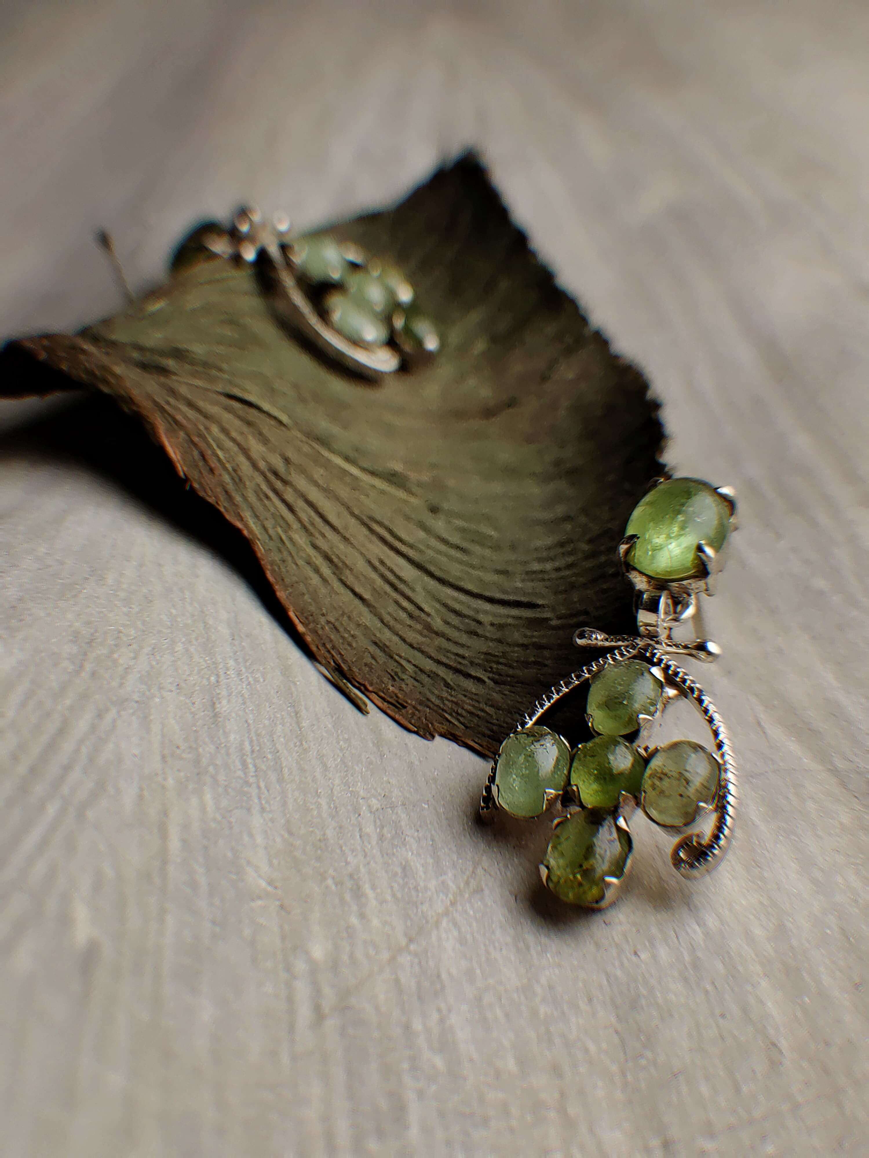 Grape seeds: A handcrafted Earrings featuring Peridot and hues of Green.