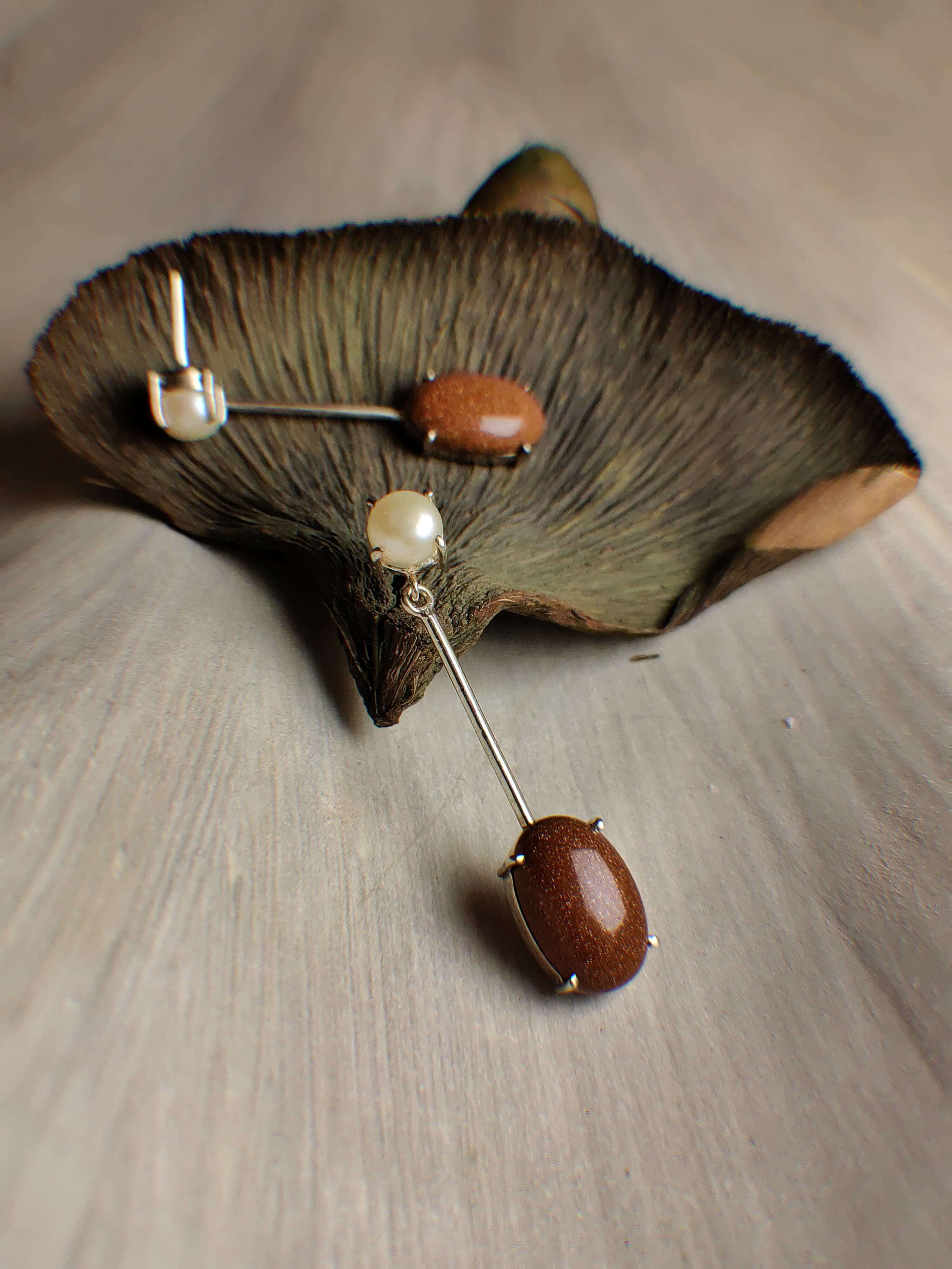 Humming bird: A handcrafted Earrings featuring Pearl Sandstone and hues of White Brown.