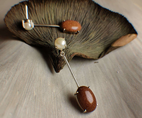 Humming bird: A handcrafted Earrings featuring Pearl Sandstone and hues of White Brown.