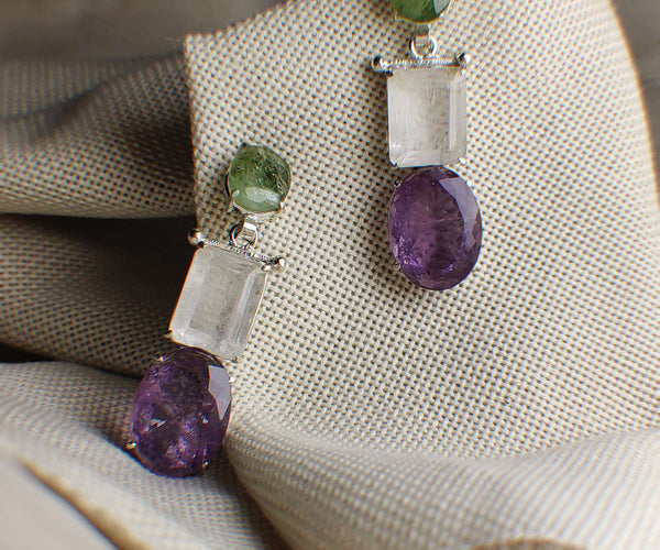 Zeenia: A handcrafted Earrings featuring Amethyst Quartz Peridot and hues of Green White Purple.