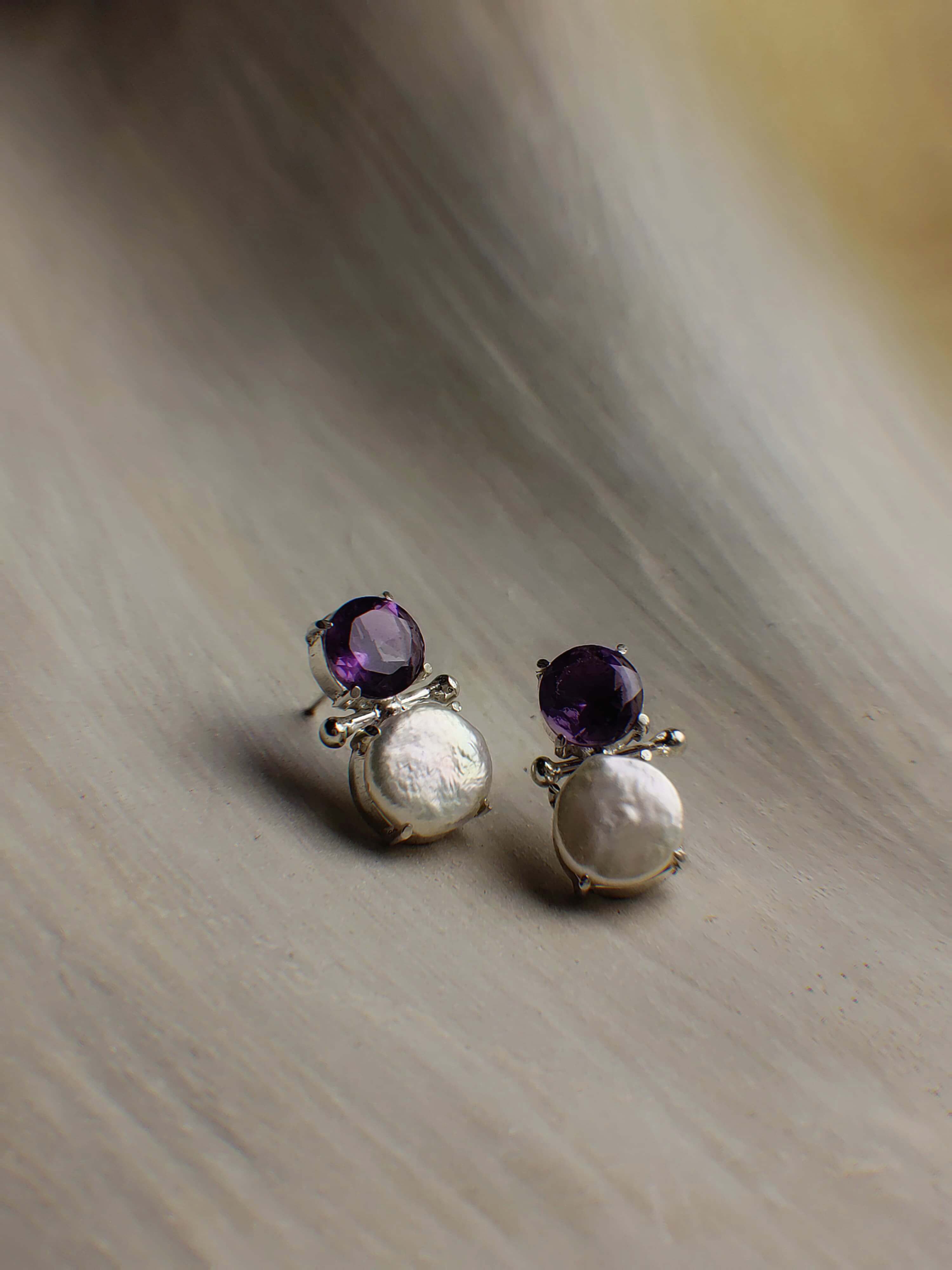 Amara: A handcrafted Earrings featuring Amethyst Pearl and hues of White Purple.