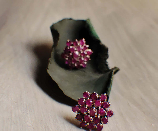 Daydreams: A handcrafted Earrings featuring Ruby and hues of Red Pink.