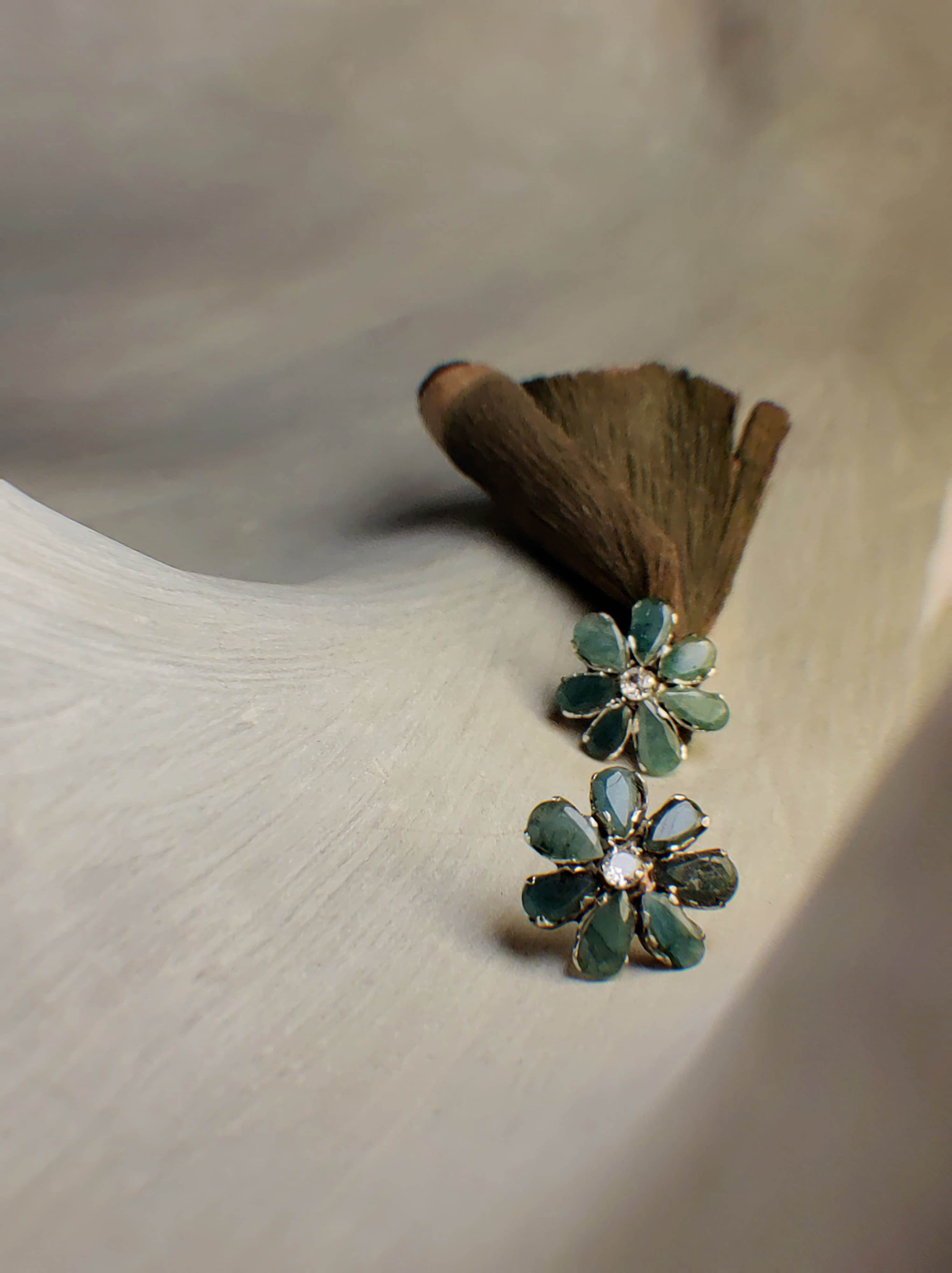 Forest: A handcrafted Earrings featuring Emerald  Zirconia and hues of Green White.