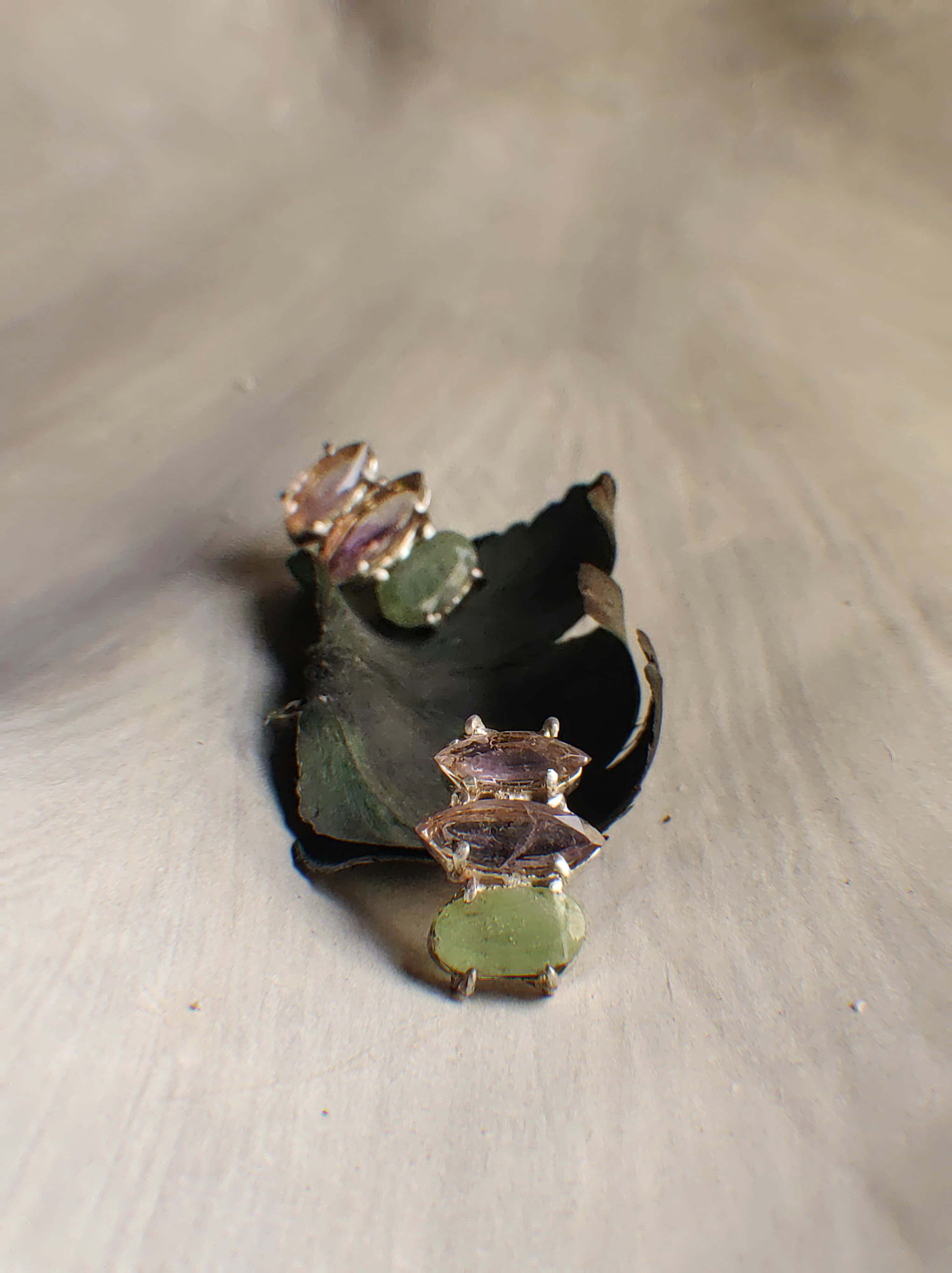 Sona: A handcrafted Earrings featuring Peridot Amethyst and hues of Green Purple.