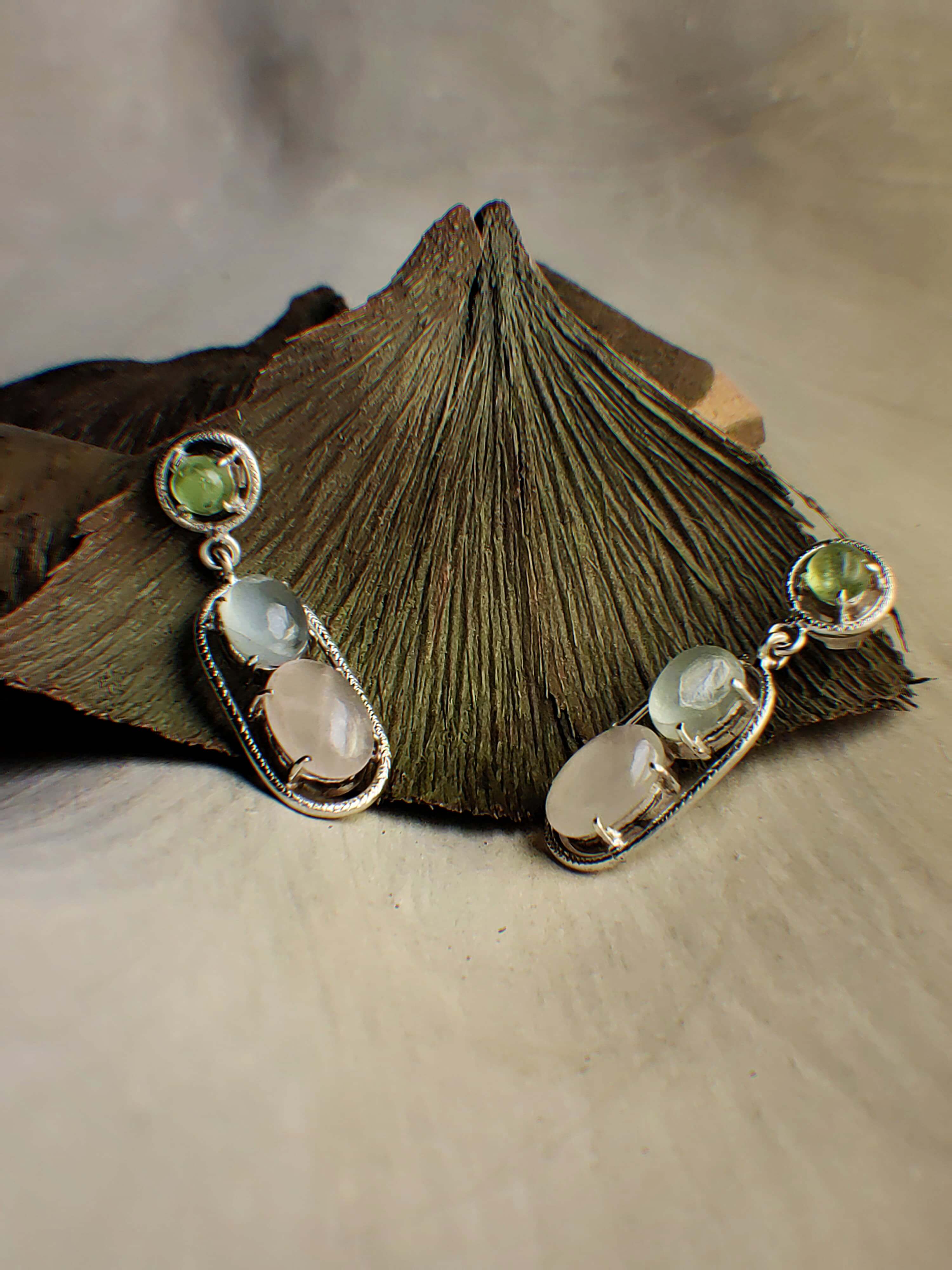 Morning Mirage: A handcrafted Earrings featuring Aquamarine Quartz Peridot and hues of Blue Pink Green.