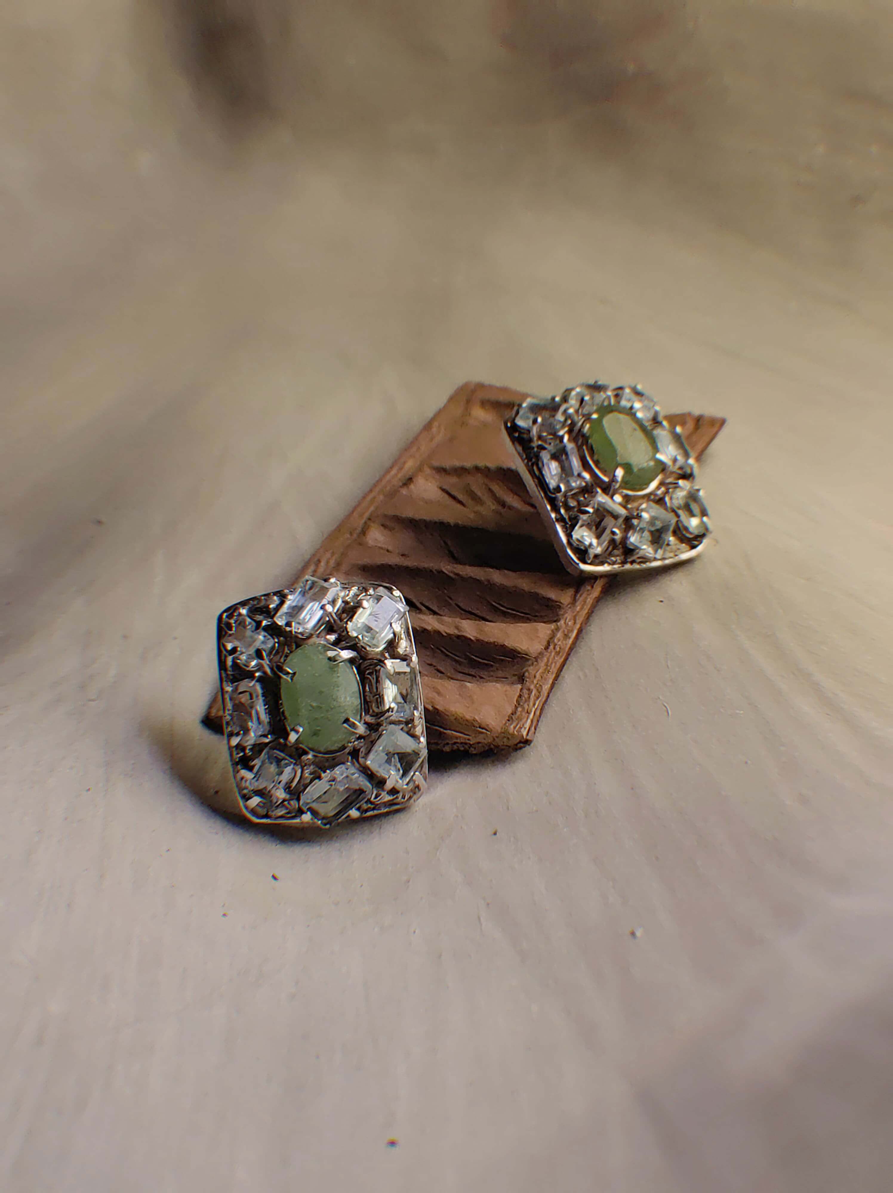 Love Notes: A handcrafted Earrings featuring Aquamarine Peridot and hues of Blue Green.