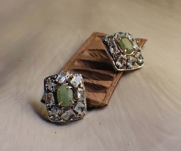 Love Notes: A handcrafted Earrings featuring Aquamarine Peridot and hues of Blue Green.