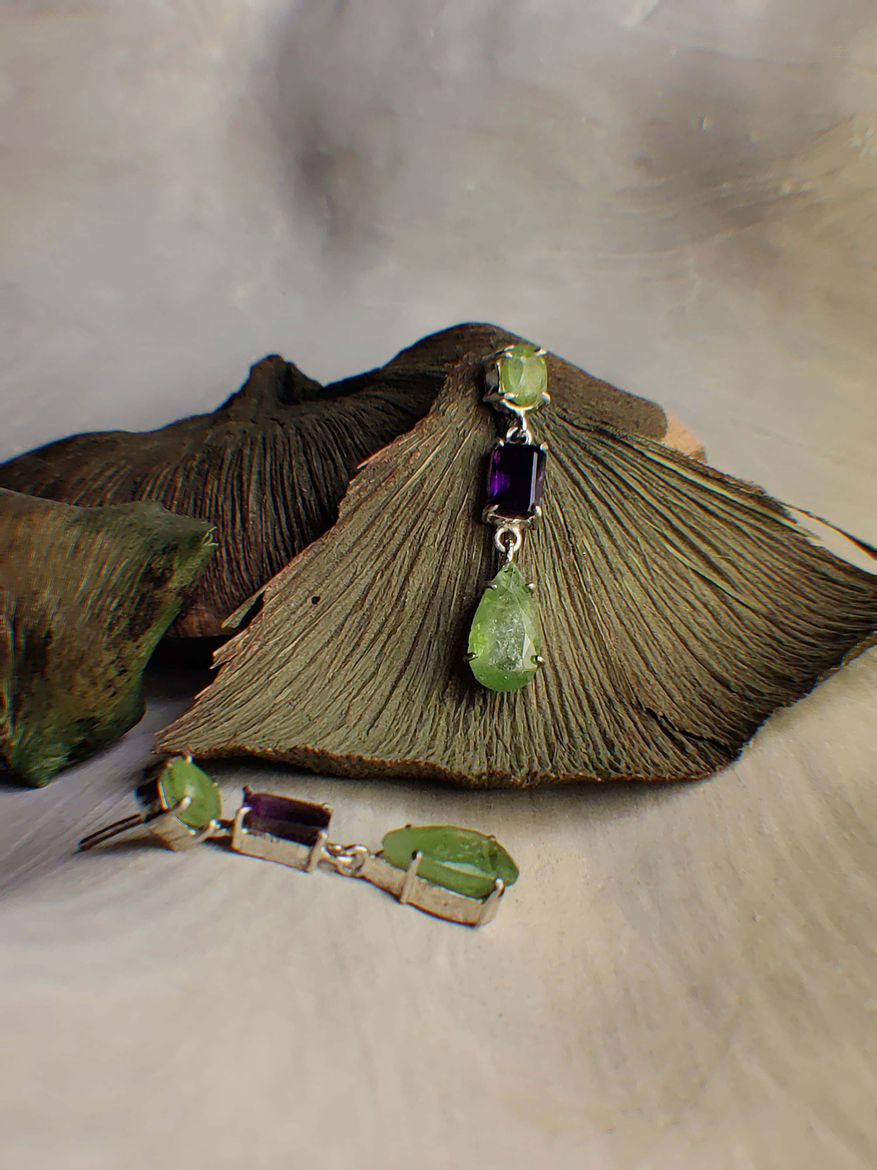 Fiza: A handcrafted Earrings featuring Peridot Amethyst and hues of Green Purple.
